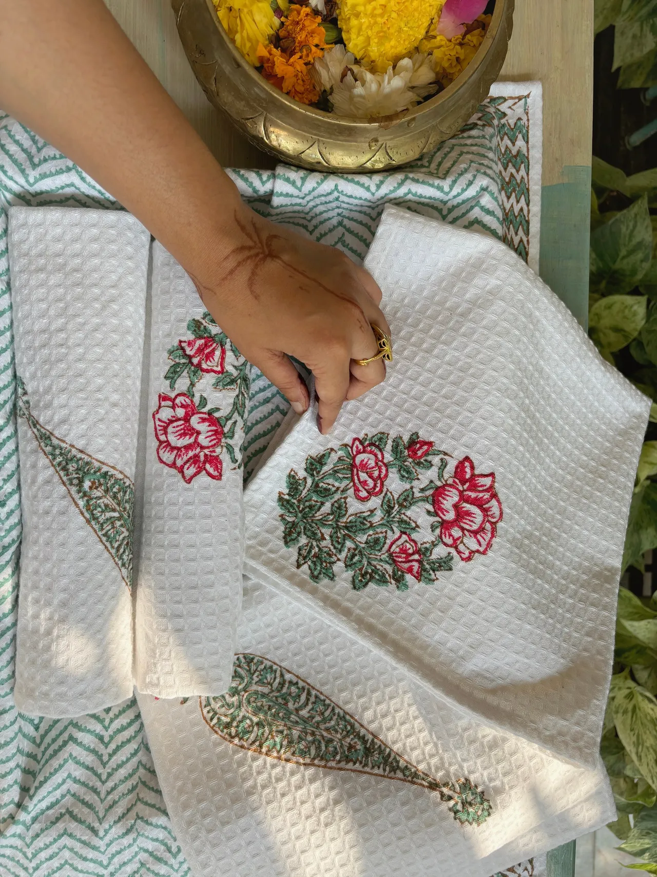 Hand-embroidered floral textiles from the Shwaas boutique
