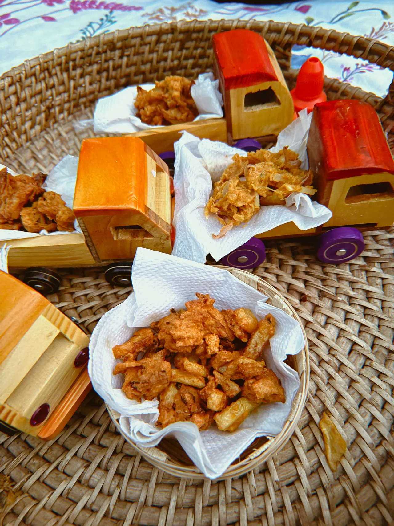 Fritters for the children, served in wooden toy trucks